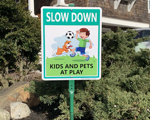Slow Children Playing Stake Sign