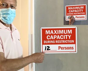 Maximum capacity signs for social distancing