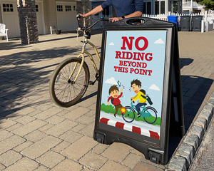 No biking on sidewalk signs