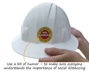Use a bit of humor with this hard hat sticker – to make sure everyone understand the importance of social distancing