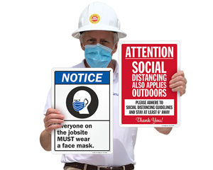 Wear a mask and social distancing signs for construction job site