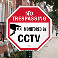 No trespassing monitored by CCTV with graphic Signs