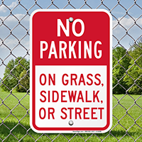 No Parking On Grass, Sidewalk, Or Street Signs