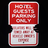 Violators Will Be Towed, Hotel Guests Parking Only Sign