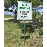 No mowing beyond this point sign