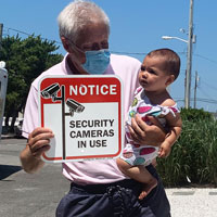 Security cameras sign