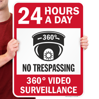 24 hours a day: No trespassing sign