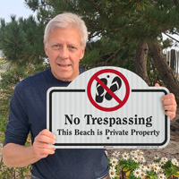 No trespassing sign for private beach property