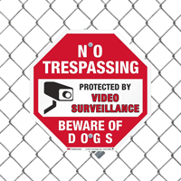 No trespassing sign with beware of dogs warning