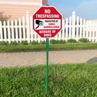 No trespassing beware of dogs video surveillance sign for lawn