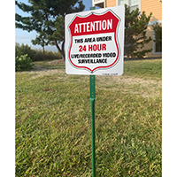 Under video surveillance sign for lawn