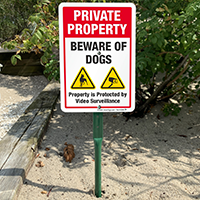 Property under video surveillance beware of dog sign