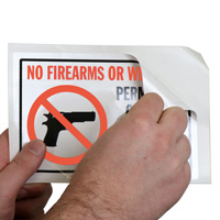No guns knives allowed sign