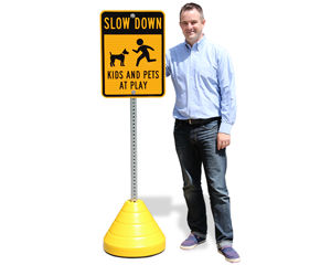 Heavy duty rubber sign bases from recycled tires