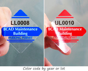 Color-coded parking permit stickers in a diamond shape