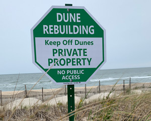 Dune rebuilding keep off dunes sign