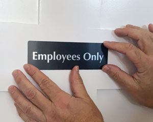 employees only door sign