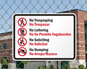 Bilingual No Hanging Around Sign