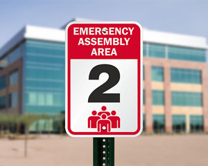 Outdoor emergency assembly area sign