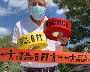 Social distancing barricade tape