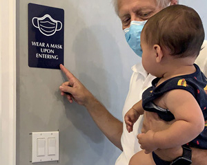 Wear a mask sign for entrance