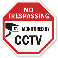 No trespassing monitored by CCTV with graphic sign