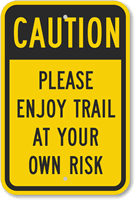 Please Enjoy Trail At Your Own Risk Sign