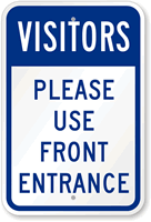 Visitors Use Front Entrance Sign