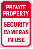 Security Cameras In Use No Trespassing Sign