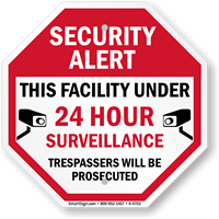 Security Alert This facility under 24hrs surveillance sign