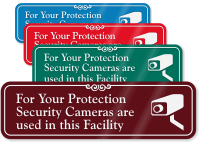 Security Camera with Graphic ShowCase™ Wall Sign