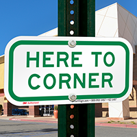 Here To Corner Supplemental Parking Signs