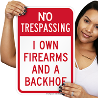 I Own Firearms And A Backhoe Sign