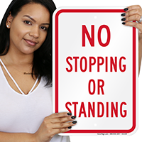 NO STOPPING OR STANDING Signs