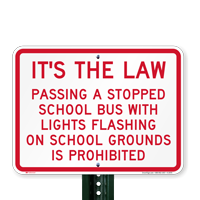 Passing Stopped Bus with lights prohibited Signs