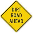 Dirt Road Ahead Sign