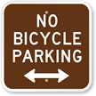 No Bicycle Parking Sign with Bidirectional Arrow