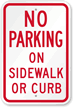 No Parking On Sidewalk Or Curb Sign