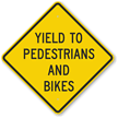 Yield To Pedestrians And Bikes Sign