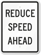 Reduce Speed Ahead Sign