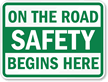 On The Road Safety Begins Here Sign