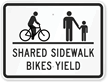 Shared Sidewalk Bikes Sign