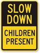 Slow Down Children Present Sign