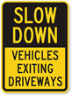 Slow Down Vehicles Exiting Driveways Sign