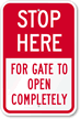 Stop Here For Gate To Open Completely Sign