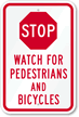 Stop   Watch For Pedestrians And Bicycles Sign