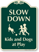 Slow Down Kids And Dogs At Play Sign