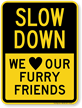 We Love Our Furry Friends Slow Down Sign