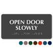 Open Door Slowly TactileTouch™ Sign with Braille