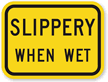 Slippery When Wet Road Sign